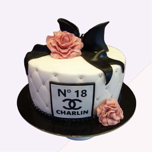 Geburtstagstorte Chanel-Schwarze-Schleife | Lézardtorten Berlin